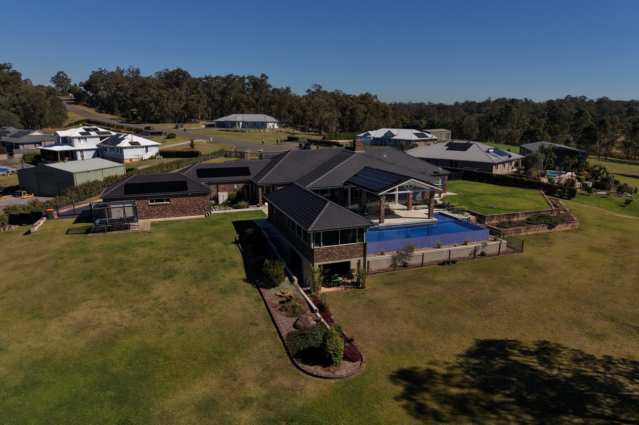 The house and pool from the north