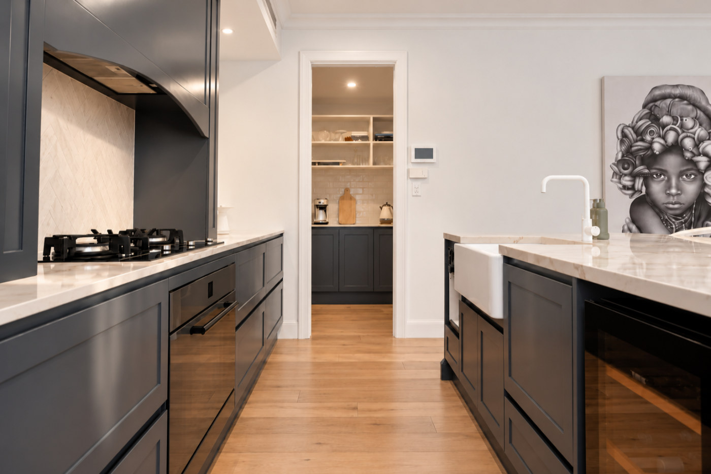 Galley kitchen running through to the butler&rsquo;s pantry