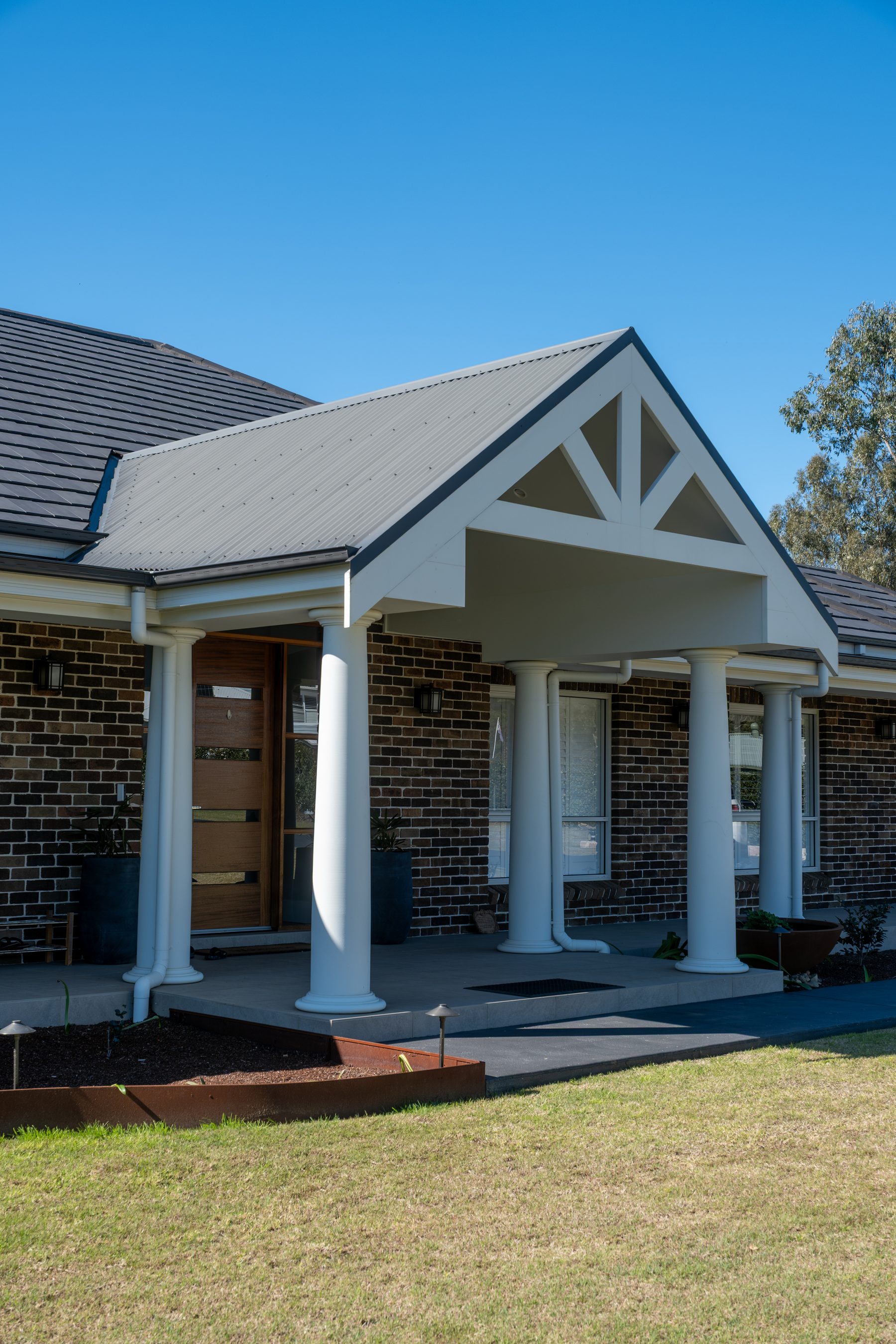 Front portico and entry of a completed Birch Residential home